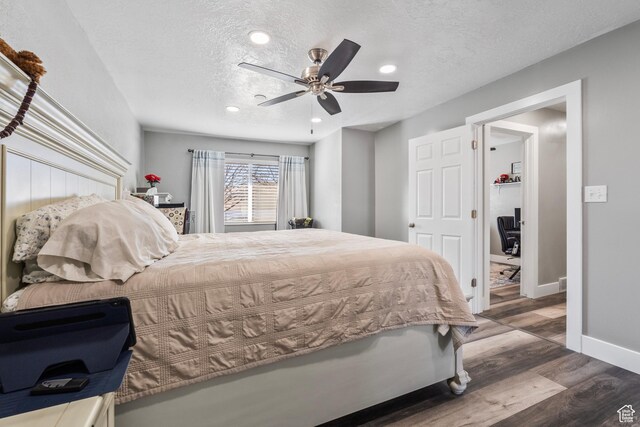 2490 W 12195 S, Riverton, UT 84065 - bedroom with a textured ceiling, wood finished floors, baseboards, recessed lighting, and a ceiling fan