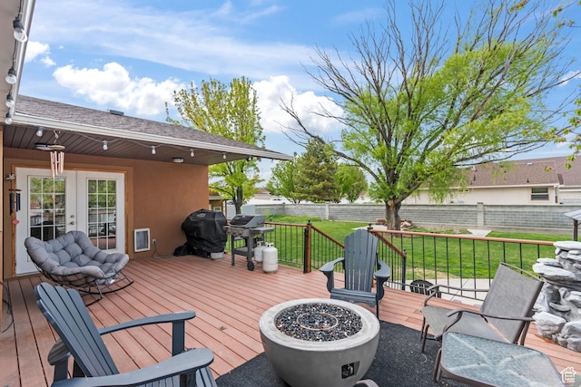 2490 W 12195 S, Riverton, UT 84065 - deck with a fire pit, french doors, and a grill