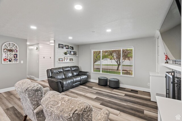 2490 W 12195 S, Riverton, UT 84065 - living room with baseboards, recessed lighting, and wood finished floors