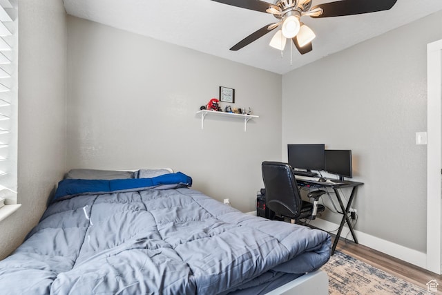 2490 W 12195 S, Riverton, UT 84065 - bedroom with wood finished floors, baseboards, and ceiling fan