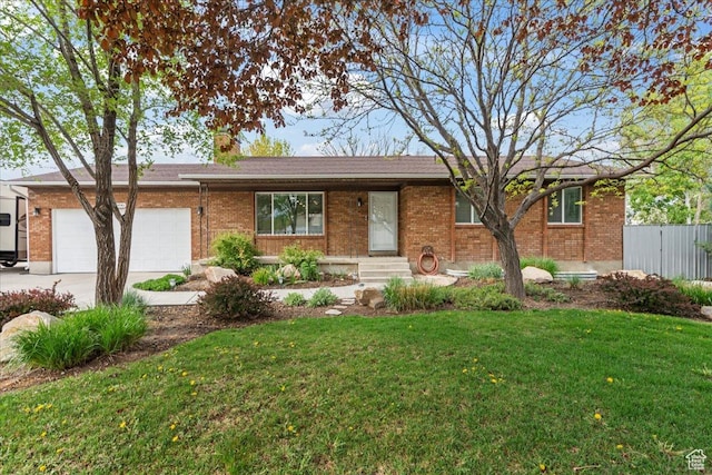 2490 W 12195 S, Riverton, UT 84065 - single story home featuring concrete driveway, an attached garage, and brick siding