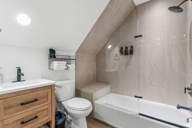 501 W 2300 S, Richfield, UT 84701 - bathroom featuring washtub / shower combination, vaulted ceiling, vanity, and toilet
