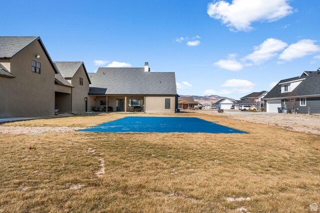 501 W 2300 S, Richfield, UT 84701 - view of swimming pool with a lawn and a residential view