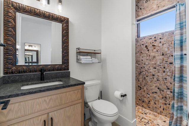 501 W 2300 S, Richfield, UT 84701 - full bathroom featuring vanity, a tile shower, and toilet