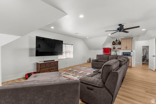 501 W 2300 S, Richfield, UT 84701 - living area with baseboards, indoor bar, vaulted ceiling, light wood-type flooring, and recessed lighting