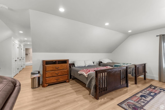 501 W 2300 S, Richfield, UT 84701 - bedroom with light wood-type flooring, vaulted ceiling, and recessed lighting