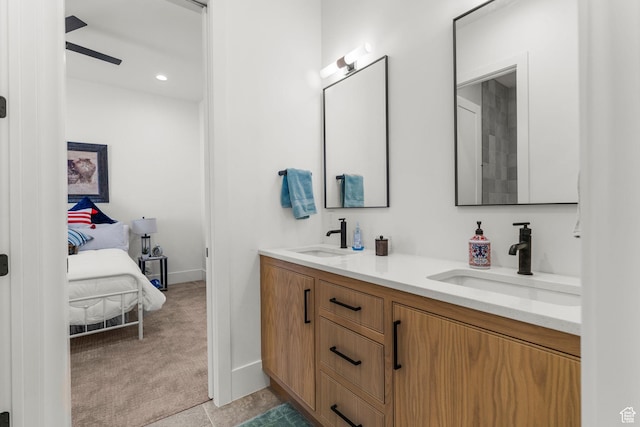 501 W 2300 S, Richfield, UT 84701 - full bathroom with double vanity, recessed lighting, a sink, and baseboards
