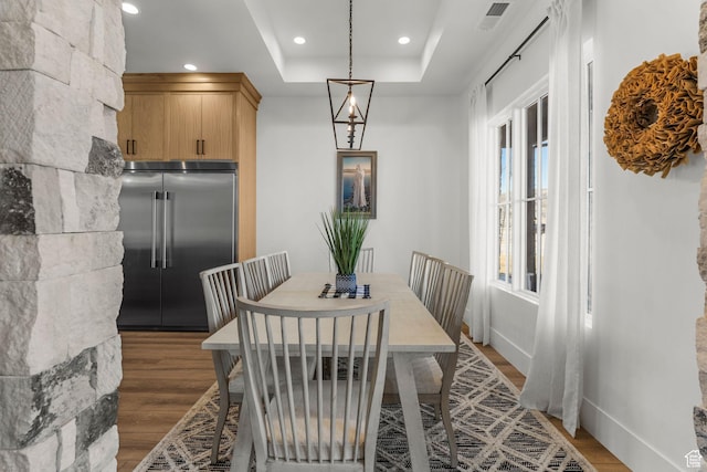501 W 2300 S, Richfield, UT 84701 - dining space with a tray ceiling, light wood-style flooring, visible vents, and recessed lighting