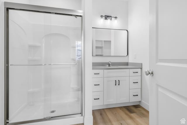 271 N 1160 N Unit 32, Tooele, UT 84074 - full bath with a stall shower, vanity, and wood finished floors