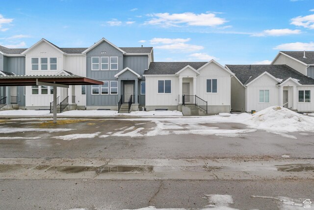 271 N 1160 N Unit 32, Tooele, UT 84074 - view of property featuring a shingled roof and board and batten siding