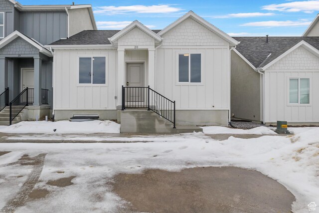 271 N 1160 N Unit 32, Tooele, UT 84074 - view of front of property featuring a shingled roof and board and batten siding