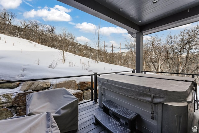 4371 Frost Haven Rd, Park City, UT 84098 - snow covered deck featuring a hot tub and grilling area