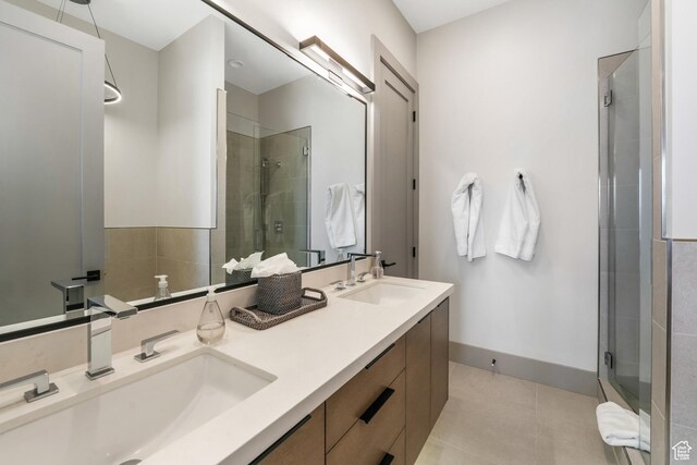 4371 Frost Haven Rd, Park City, UT 84098 - bathroom with double vanity, tile patterned floors, a sink, and a shower stall