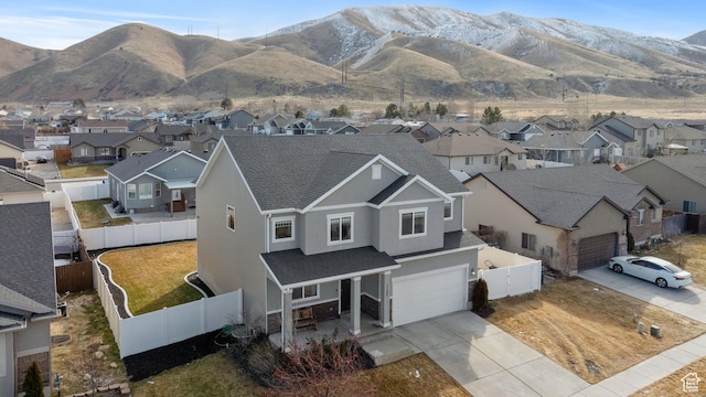 exterior space featuring a residential view and a mountain view