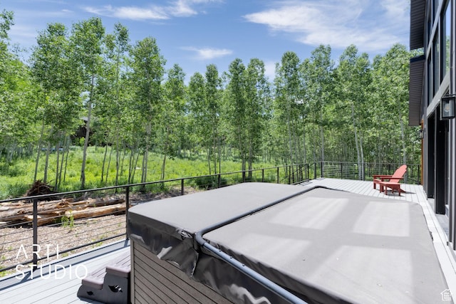 11472 E Marigold Ln, Heber City, UT 84032 - wooden deck featuring a hot tub and view of wooded area
