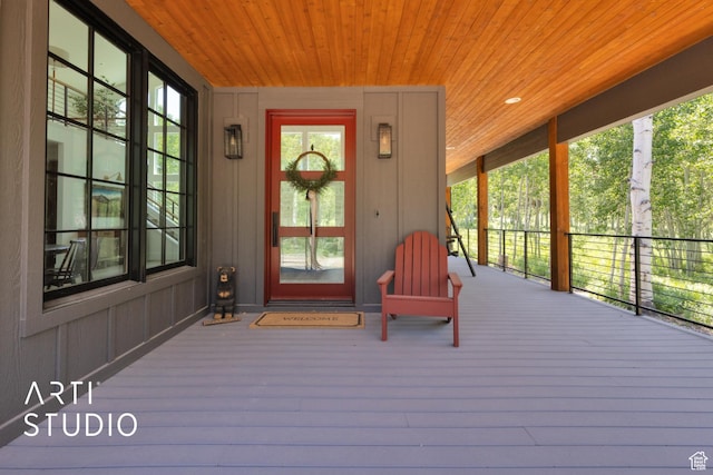 11472 E Marigold Ln, Heber City, UT 84032 - view of exterior entry with a porch and board and batten siding