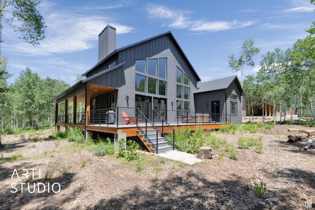 11472 E Marigold Ln, Heber City, UT 84032 - back of house with a chimney, board and batten siding, and a wooden deck