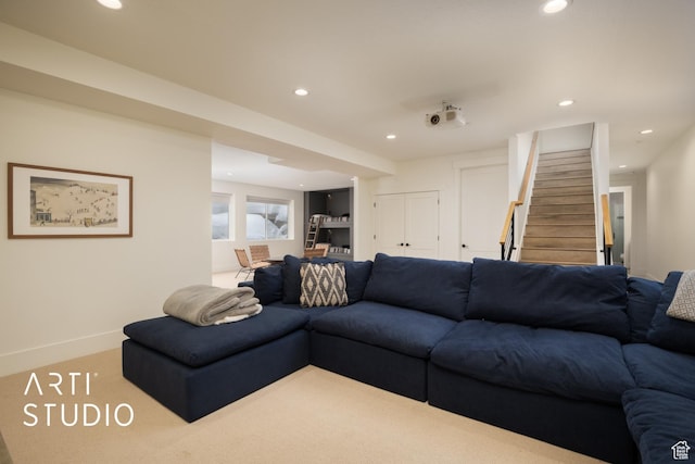 living area with recessed lighting, carpet, stairway, and baseboards