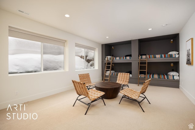 office space featuring carpet, visible vents, baseboards, and recessed lighting