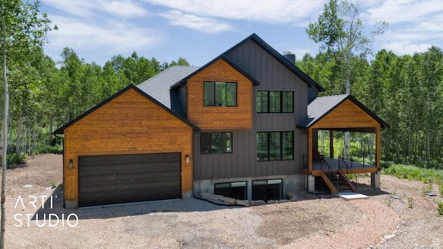 11472 E Marigold Ln, Heber City, UT 84032 - view of front of property with an attached garage, driveway, stairway, and a chimney