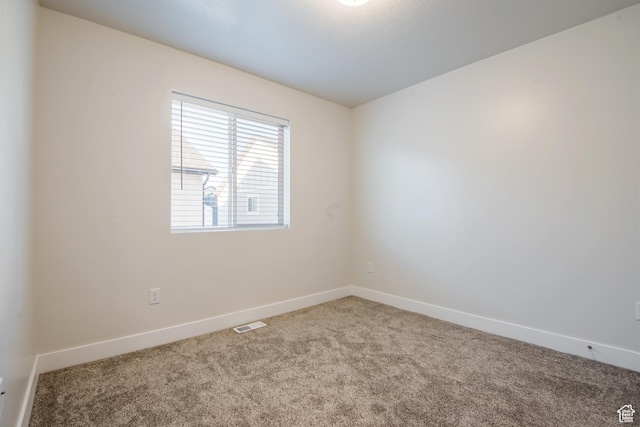 336 N 100 W, Morgan, UT 84050 - spare room with visible vents, baseboards, and carpet flooring