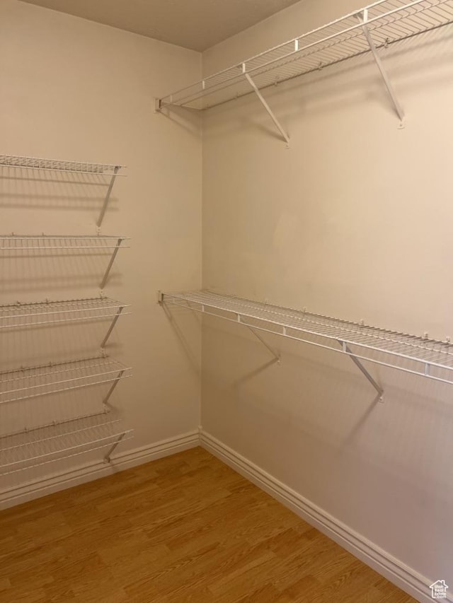 196 E Spencer Peak Way S Unit D9, Draper, UT 84020 - spacious closet featuring wood finished floors