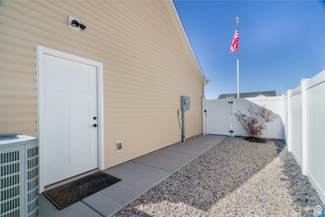 1044 E Southern Homestead Blvd, Enoch, UT 84721 - view of property exterior featuring a gate, fence, and central AC