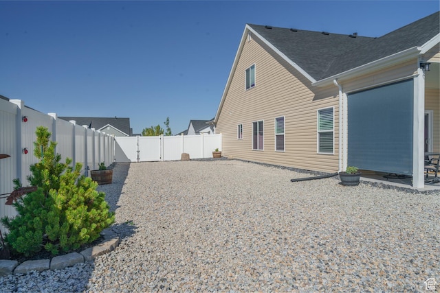 1044 E Southern Homestead Blvd, Enoch, UT 84721 - back of property featuring a patio area and a fenced backyard