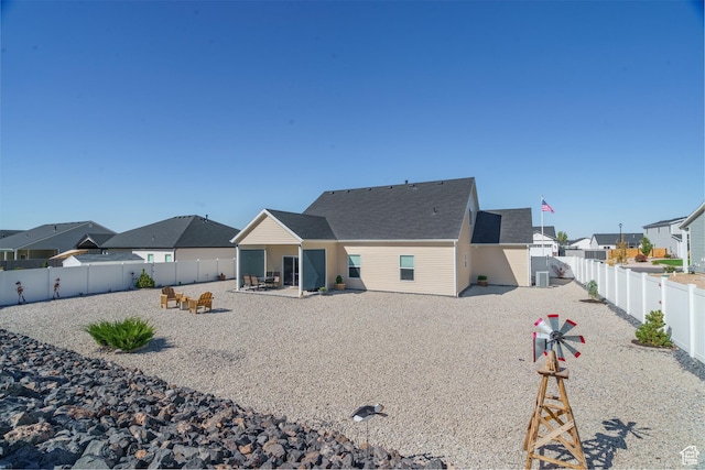 1044 E Southern Homestead Blvd, Enoch, UT 84721 - back of house with a patio area, a fenced backyard, and a residential view