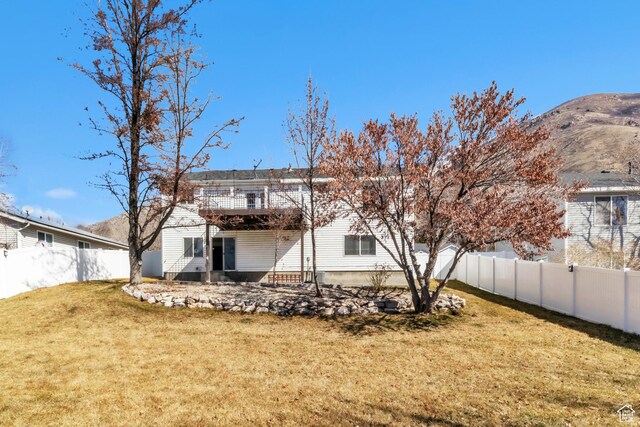 2172 S Dakota Ave, Provo, UT 84606 - back of property with a fenced backyard and a lawn