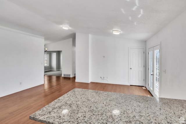 2172 S Dakota Ave, Provo, UT 84606 - interior space featuring lofted ceiling, visible vents, baseboards, and wood finished floors