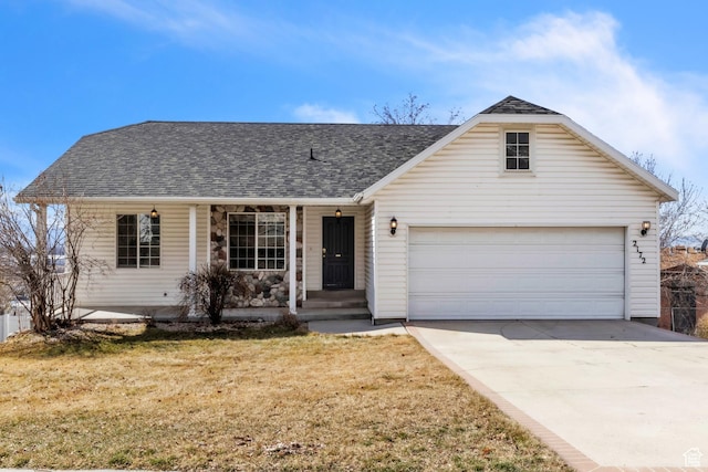 2172 S Dakota Ave, Provo, UT 84606 - view of front of property featuring driveway, a shingled roof, a porch, and a front lawn