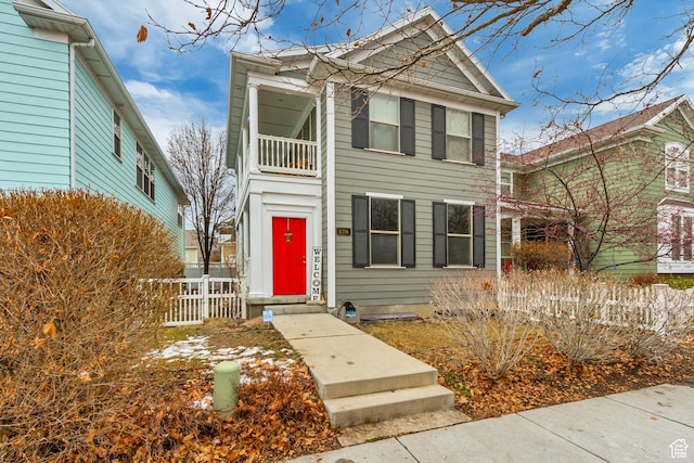11716 S Grandville Ave, South Jordan, UT 84009 - view of front of property with fence and a balcony