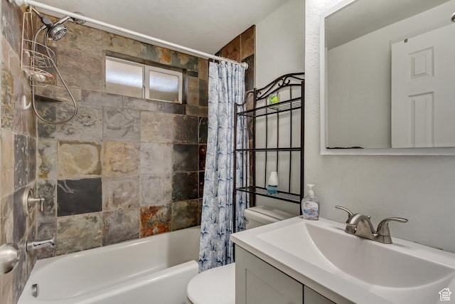 bathroom with toilet, shower / bath combo with shower curtain, and vanity