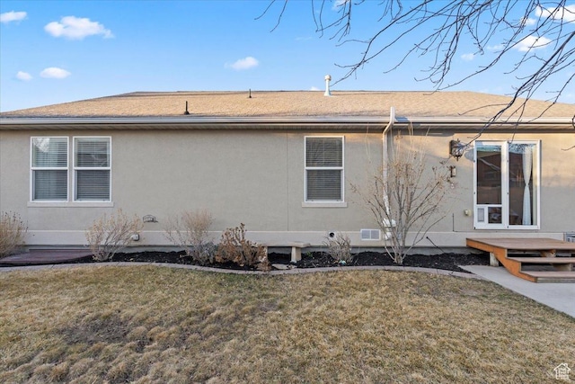 5009 W Greenstreak Dr, Riverton, UT 84096 - view of side of property featuring a lawn and stucco siding