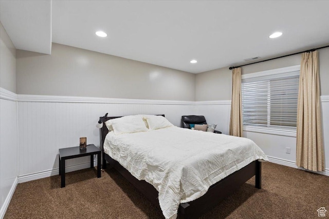 5009 W Greenstreak Dr, Riverton, UT 84096 - bedroom with carpet floors, wainscoting, and recessed lighting