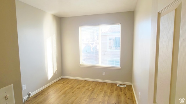 623 W Villa Bluff Dr, Sandy, UT 84070 - unfurnished room with light wood finished floors, baseboards, and visible vents