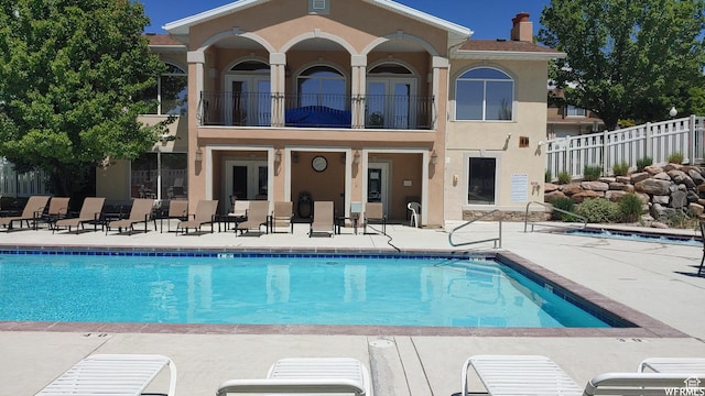 623 W Villa Bluff Dr, Sandy, UT 84070 - community pool with a patio area and fence
