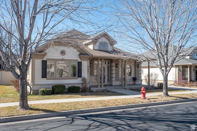 view of front facade with driveway and an attached garage