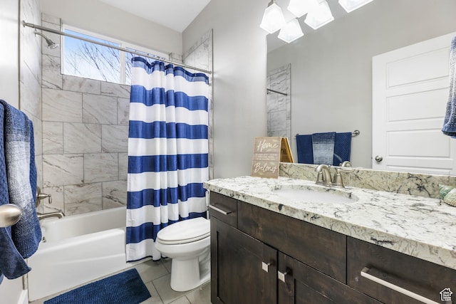 full bath with toilet, shower / tub combo, tile patterned flooring, and vanity