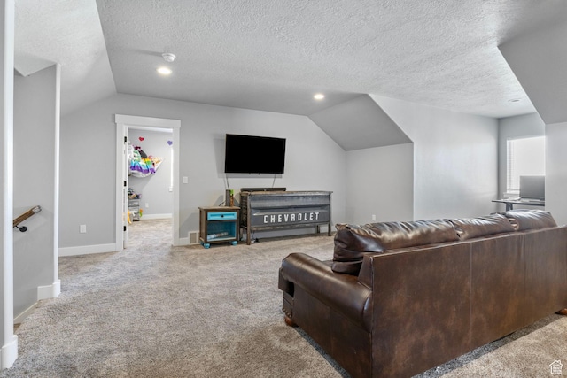 180 S Main St, Fayette, UT 84630 - carpeted living room with vaulted ceiling, a textured ceiling, and baseboards