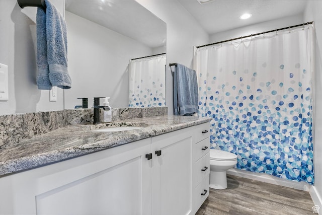180 S Main St, Fayette, UT 84630 - full bathroom featuring a shower with shower curtain, toilet, wood finished floors, vanity, and recessed lighting