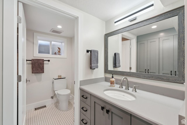 770 N 1000 E, Lehi, UT 84043 - bathroom with baseboards, vanity, toilet, and visible vents