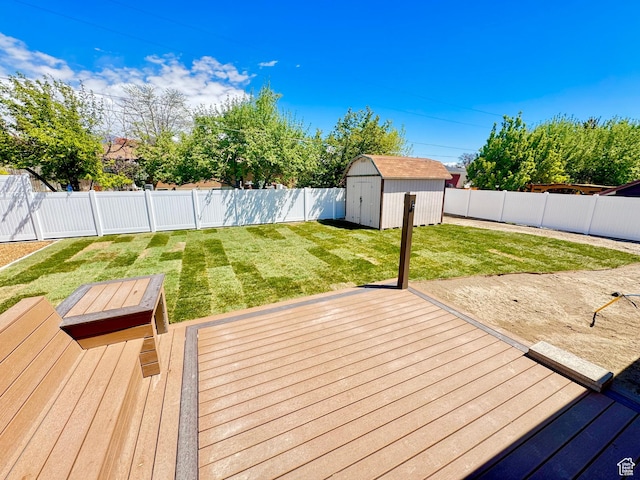 770 N 1000 E, Lehi, UT 84043 - wooden terrace featuring a fenced backyard, an outdoor structure, a lawn, and a shed