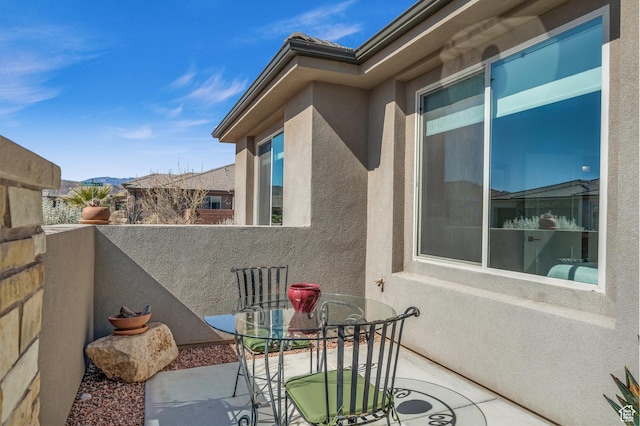 530 W Cougar Way, Ivins, UT 84738 - balcony featuring outdoor dining space, a patio area, and a mountain view