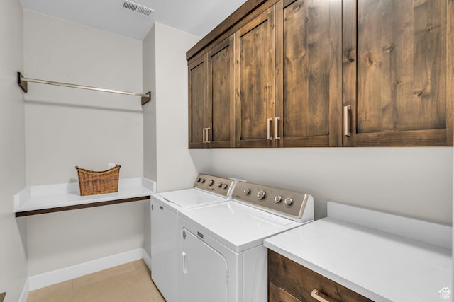 530 W Cougar Way, Ivins, UT 84738 - laundry room featuring light tile patterned floors, baseboards, visible vents, washer and dryer, and cabinet space