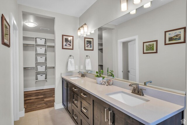 530 W Cougar Way, Ivins, UT 84738 - full bathroom featuring a spacious closet, tile patterned floors, and a sink