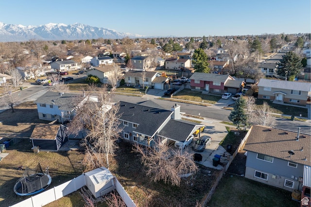 birds eye view of property with a residential view and a mountain view