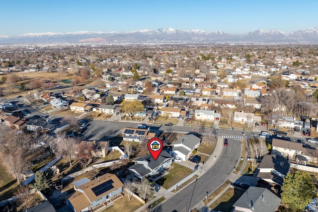 birds eye view of property with a residential view and a mountain view