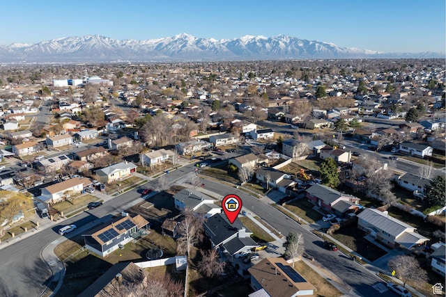 birds eye view of property featuring a residential view and a mountain view